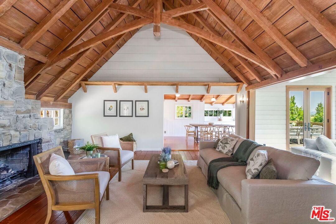 3940 Davana Road Sherman Oaks, CA 91423 - Photo 10 of 60 a living room with furniture and a large window