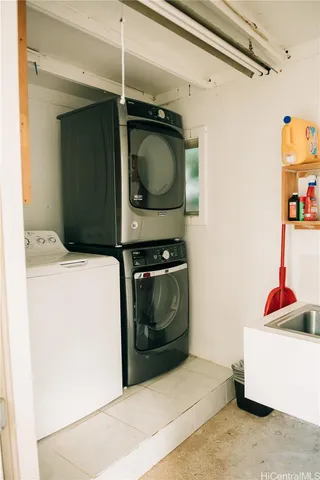 a bedroom with a bed and a night stand