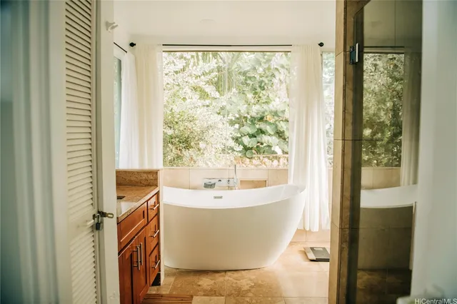 a bedroom with bed and a window