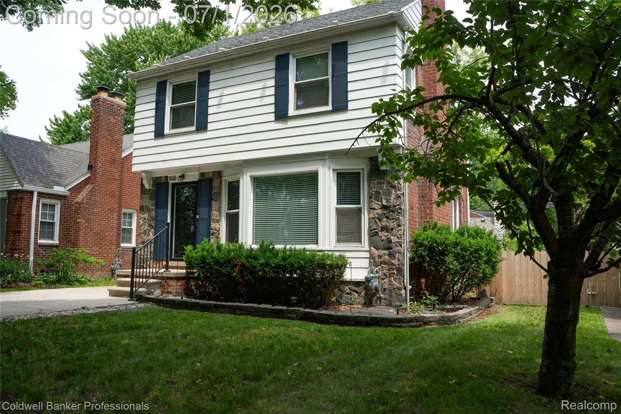 1168 Vernier Road Grosse Pointe, MI 48236 - Photo 2 of 32 Two-story residence featuring white siding and stone veneer accents