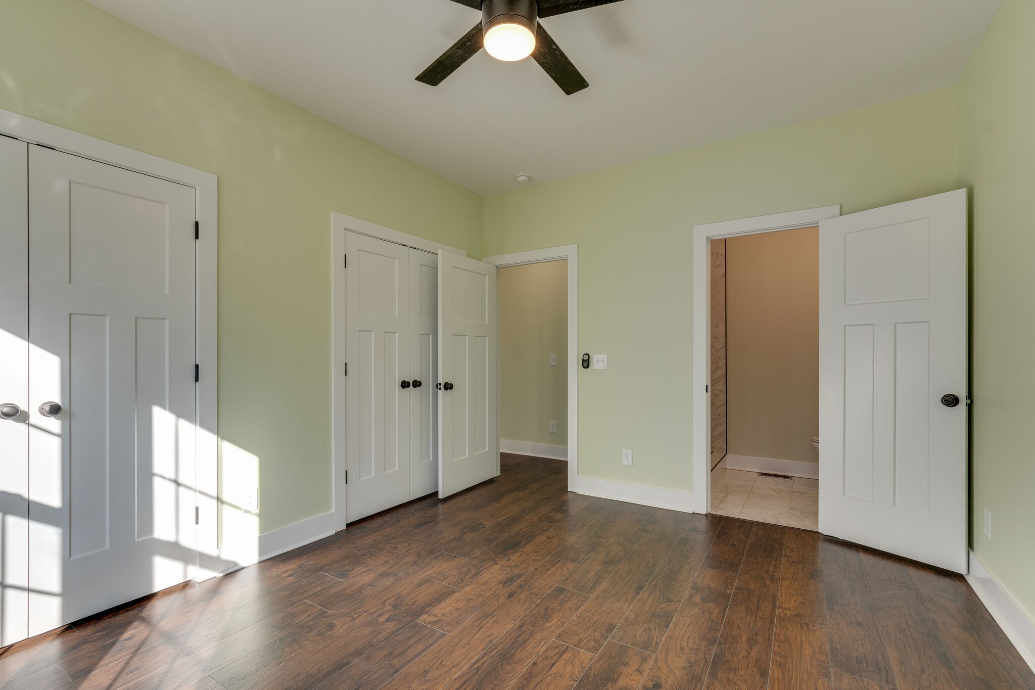 1004 Bridge Street Columbia, TN 38401 - Photo 16 of 25 wooden floor in an empty room with a window