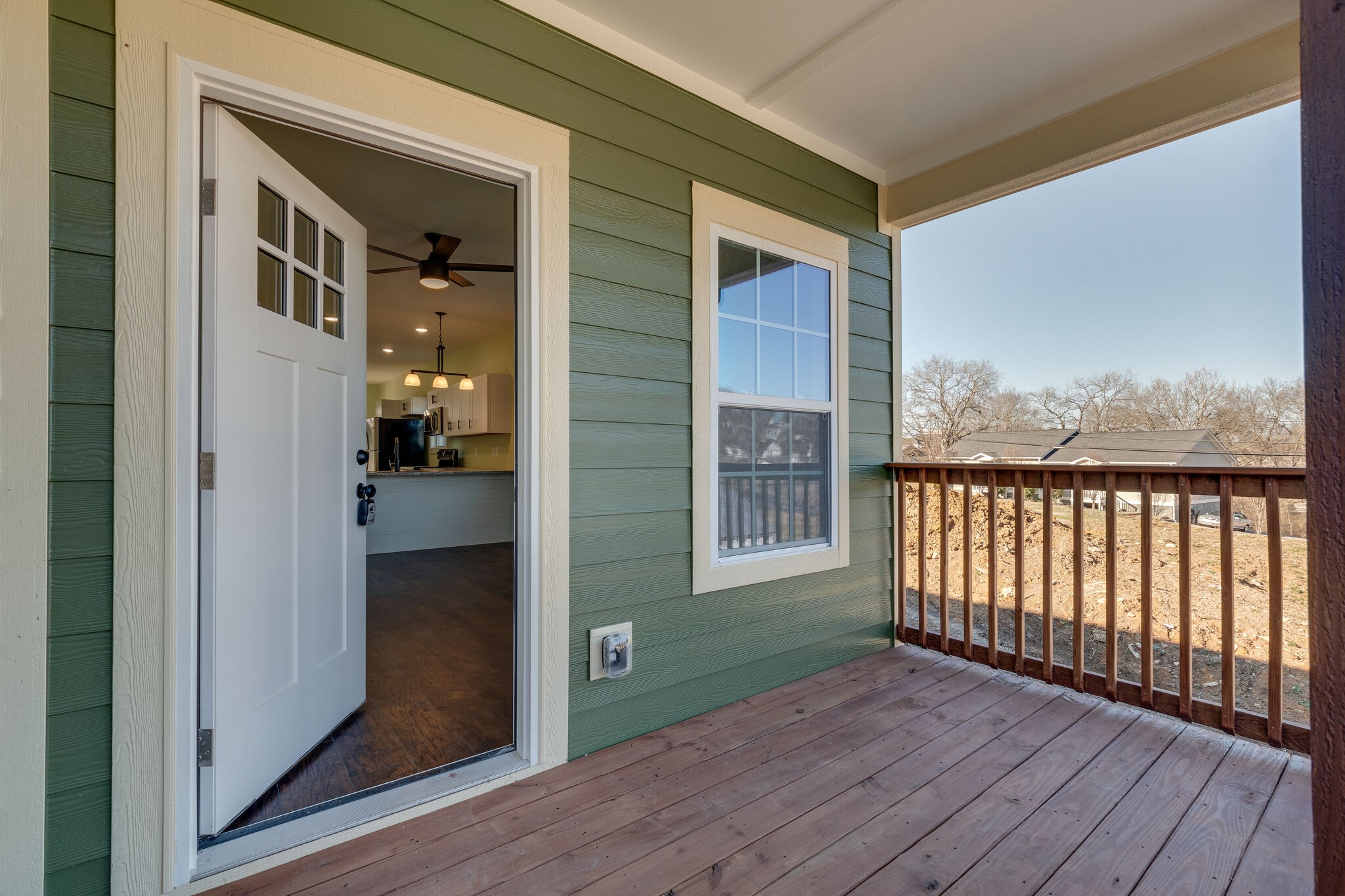 1004 Bridge Street Columbia, TN 38401 - Photo 5 of 25 a view of hallway with wooden floor and a living room