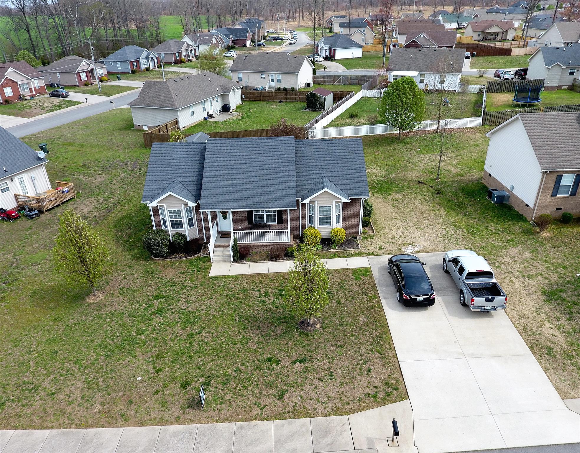 111 Filly Lane Springfield, TN 37172 - Photo 14 of 14 a view of a house with garden space and sitting area