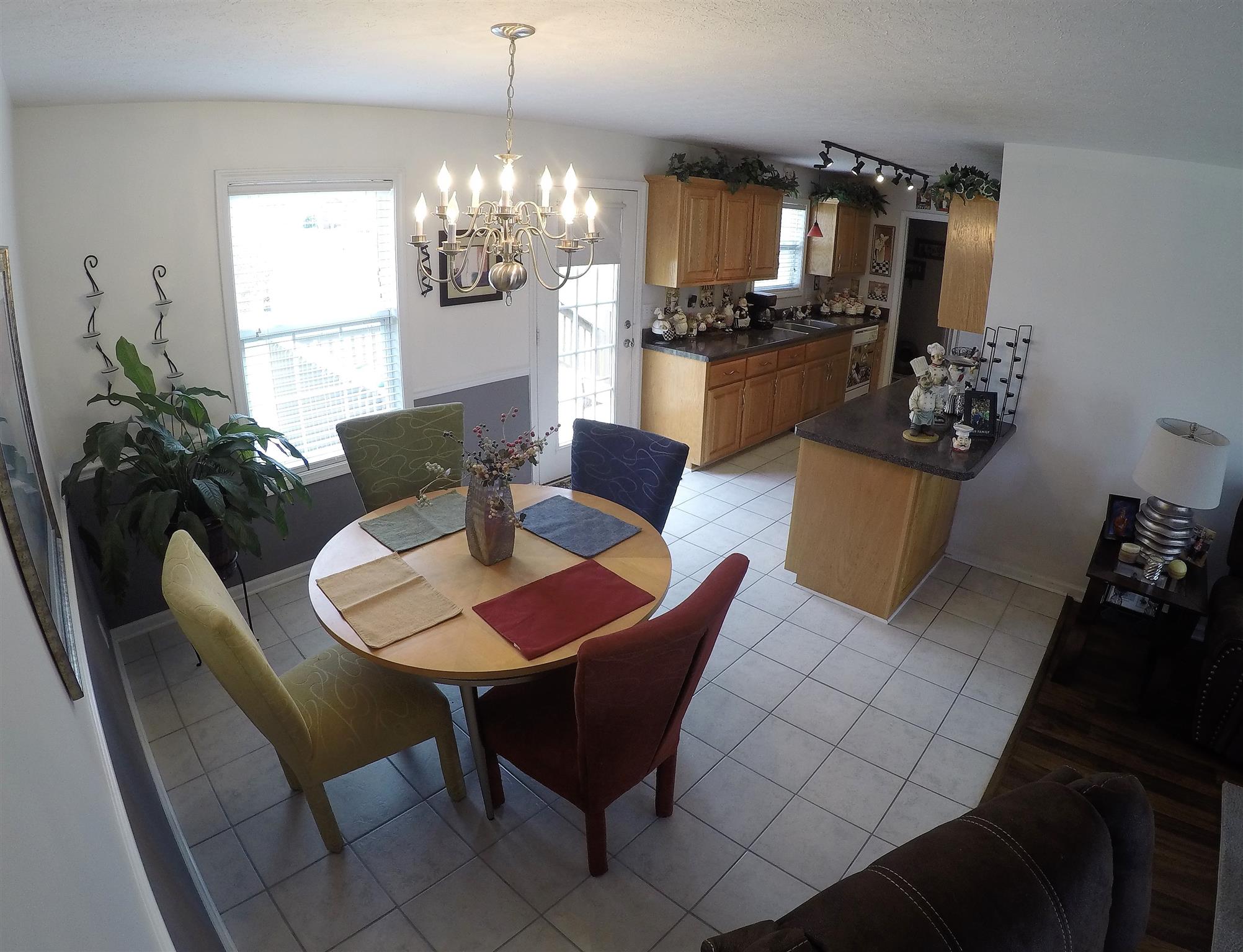 111 Filly Lane Springfield, TN 37172 - Photo 4 of 14 a dining room with furniture a chandelier and window