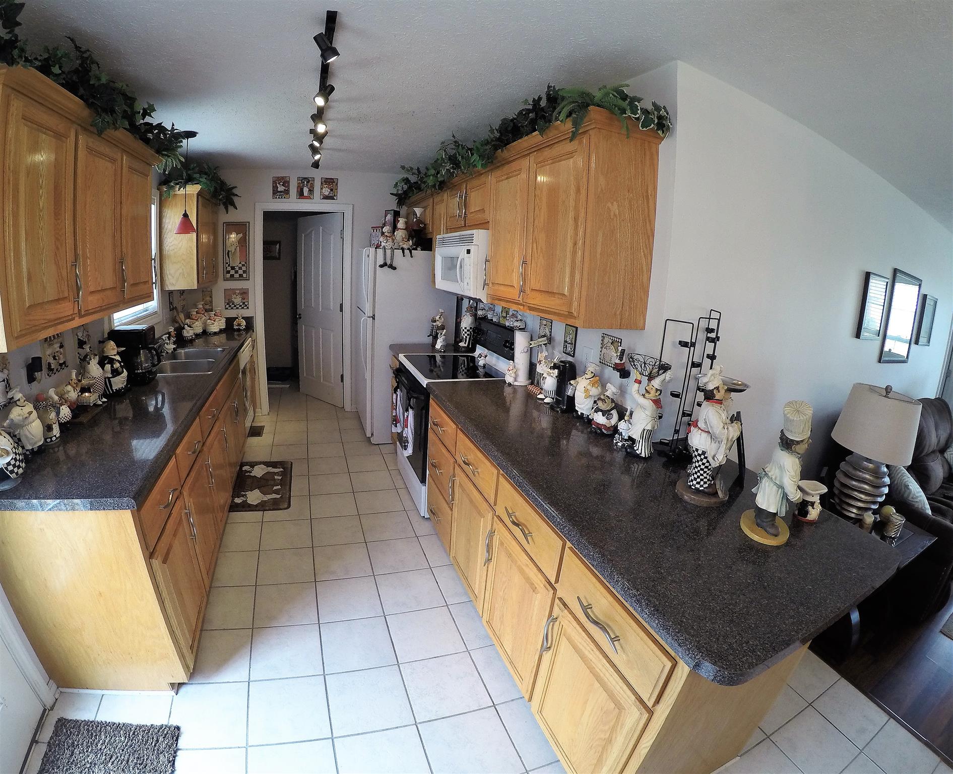 111 Filly Lane Springfield, TN 37172 - Photo 5 of 14 a hallway with a dining table and chairs