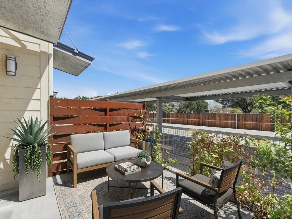 7805 Cooper Lane, Unit 608 Austin, TX 78745 - Photo 19 of 31 a outdoor living space with furniture and city view