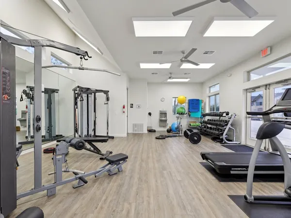a view of a room with gym equipment