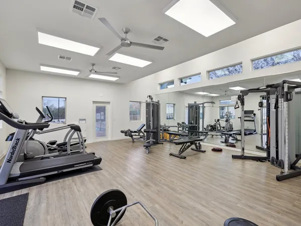 front view of a house with a sitting area