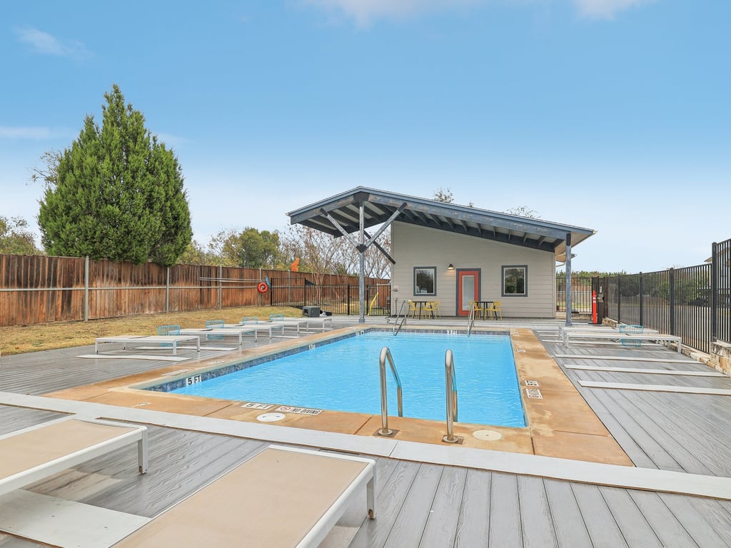 7805 Cooper Lane, Unit 608 Austin, TX 78745 - Photo 27 of 31 a view of a house with pool and sitting area