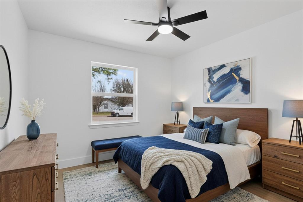 3318 Ridgefield Street Irving, TX 75062 - Photo 17 of 33 a bedroom with bed and window