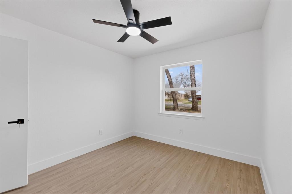 3318 Ridgefield Street Irving, TX 75062 - Photo 18 of 33 an empty room with a window