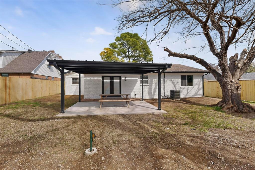 3318 Ridgefield Street Irving, TX 75062 - Photo 29 of 33 a front view of a house with garden