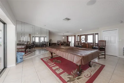 a view of a workspace with furniture and a workspace