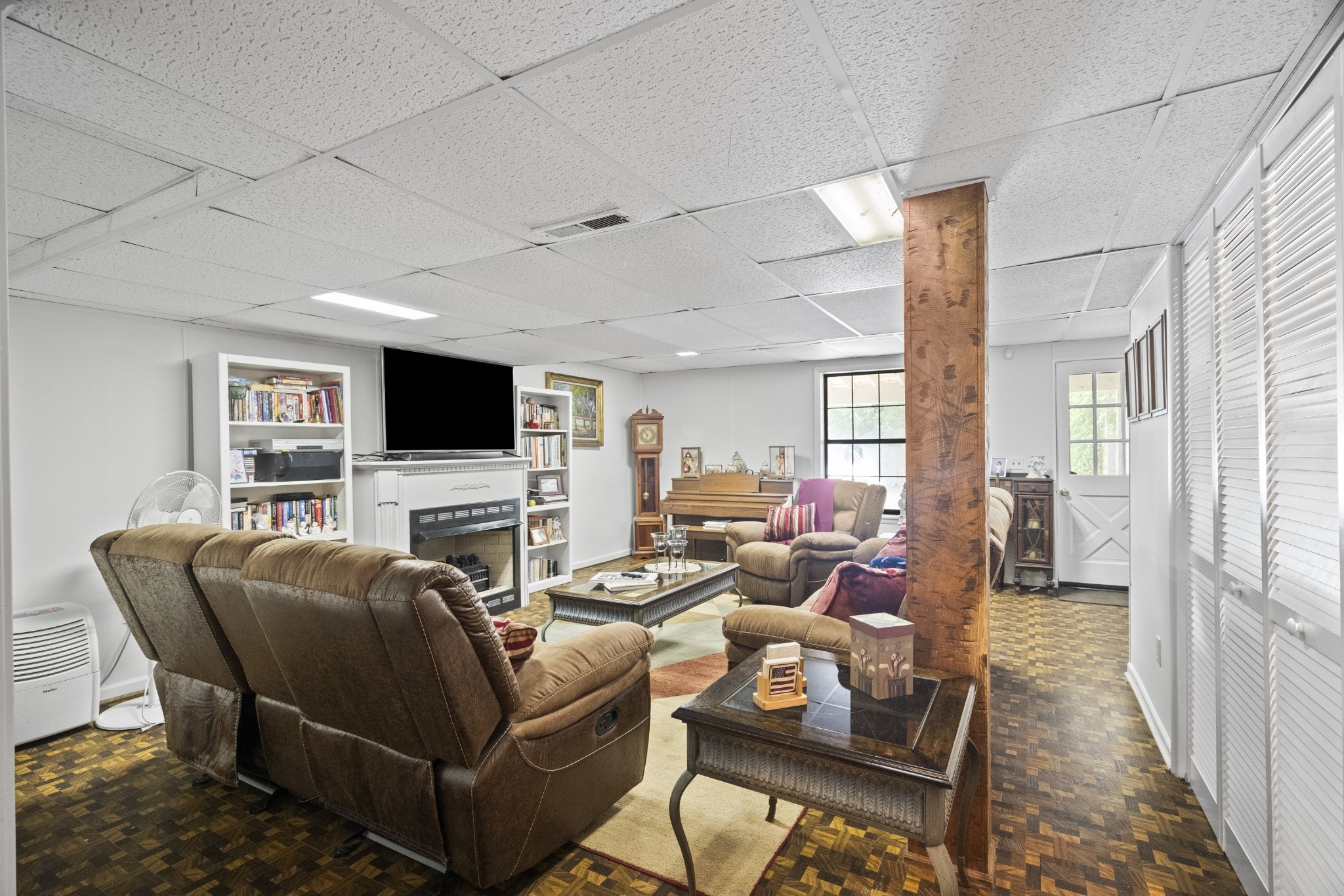 3828 Martins Chapel Road Springfield, TN 37172 - Photo 35 of 51 a living room with furniture a flat screen tv and a fireplace