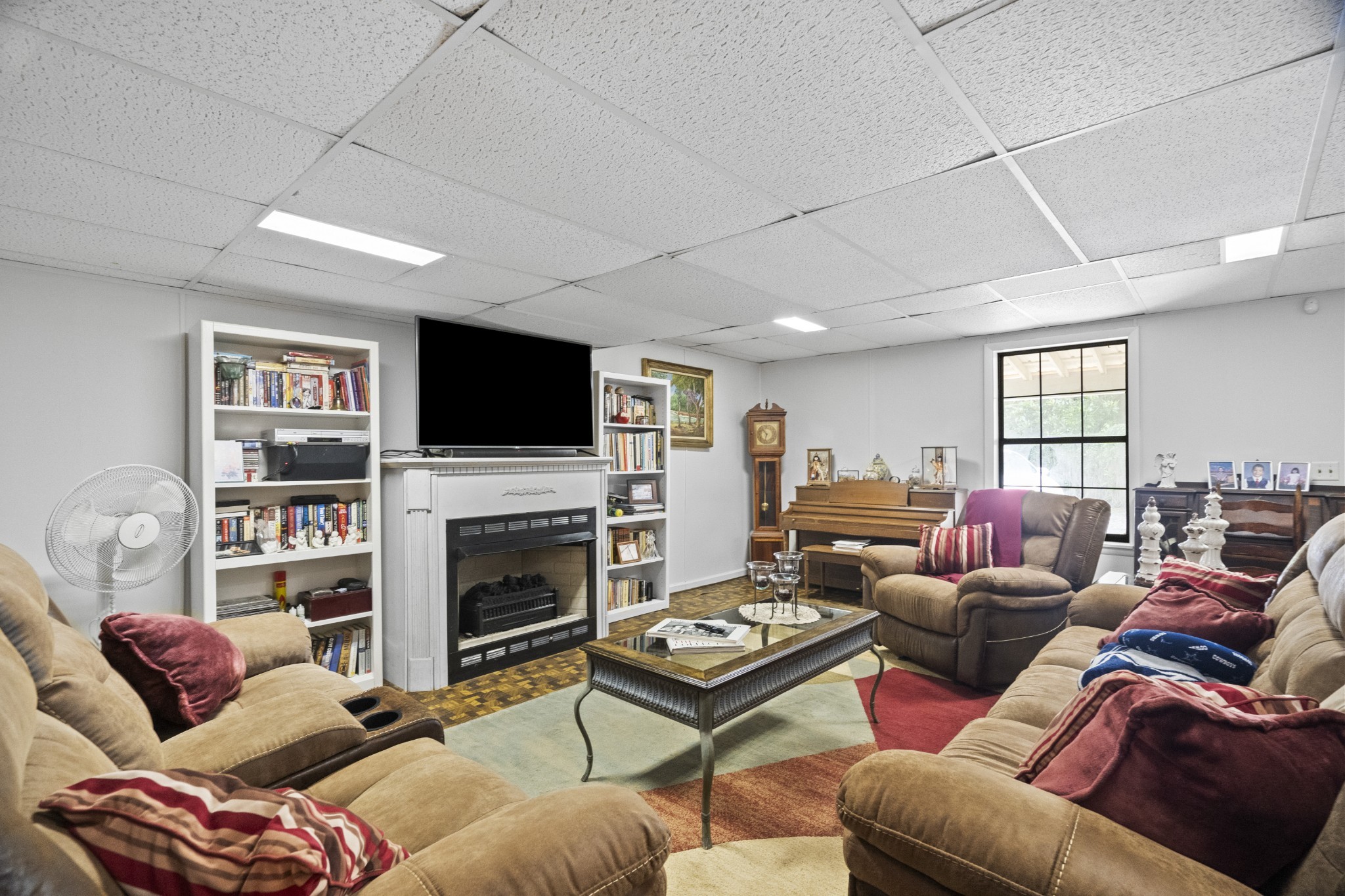 3828 Martins Chapel Road Springfield, TN 37172 - Photo 36 of 51 a living room with furniture a flat screen tv and a fireplace