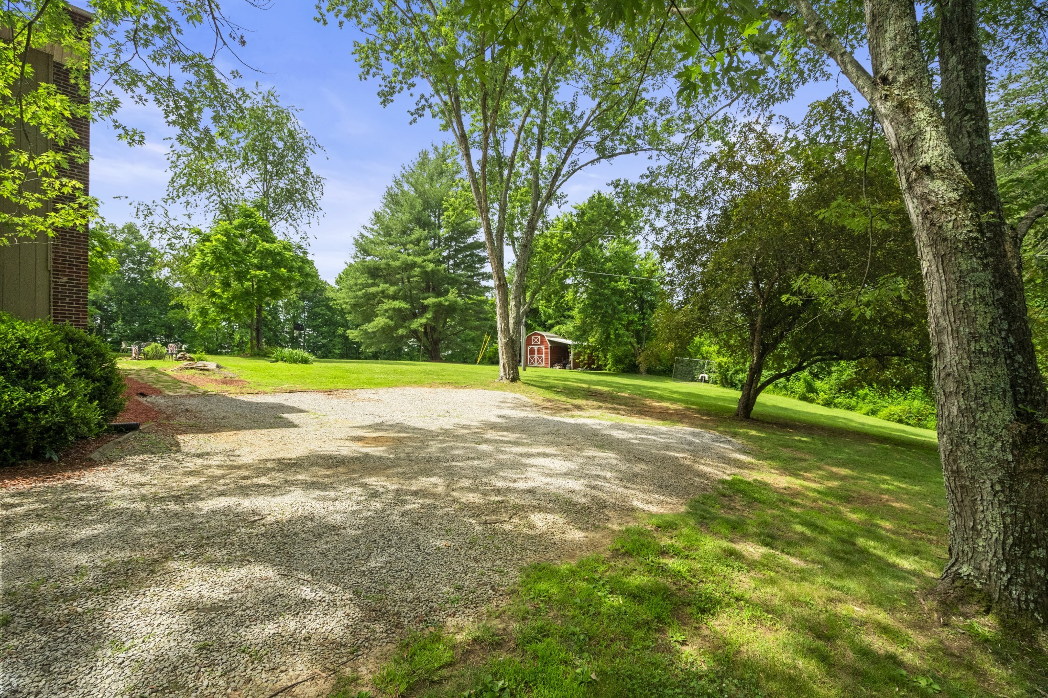 3828 Martins Chapel Road Springfield, TN 37172 - Photo 44 of 51 a view of a yard with basketball court