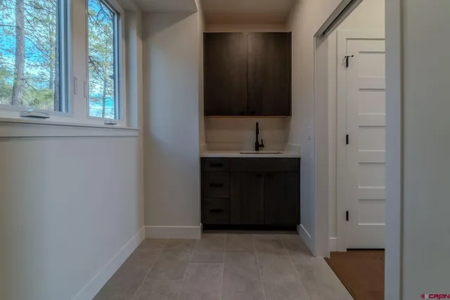 a view of balcony with wooden floor