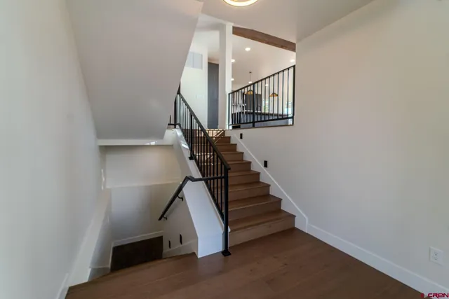 a view of entryway with wooden floor