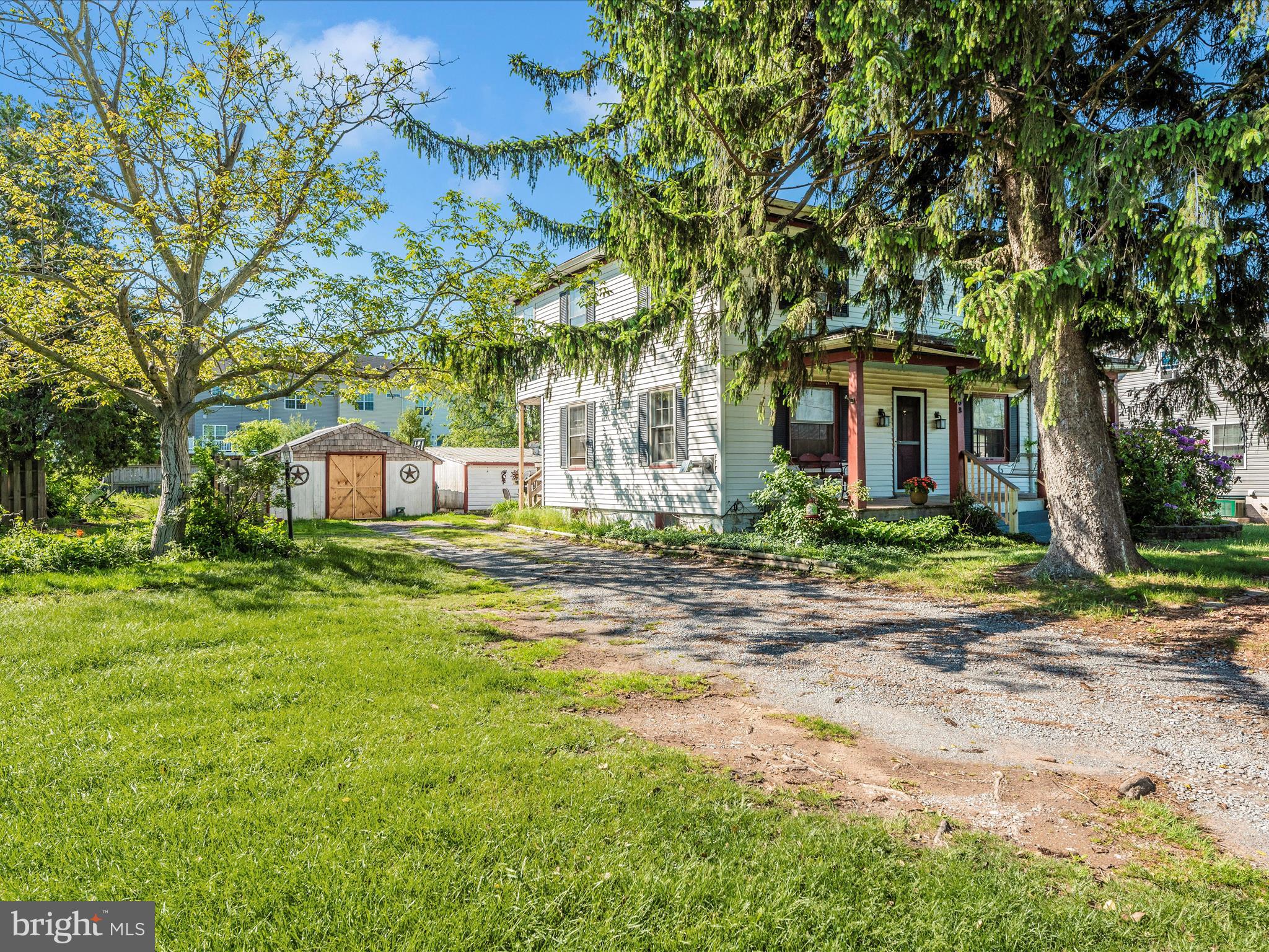 6103 Jefferson Pike Frederick, MD 21703 - Photo 53 of 57 a front view of a house with a yard