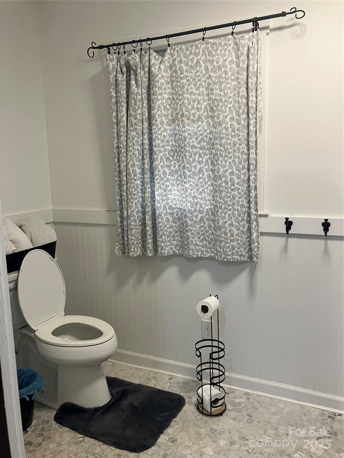 36704 Mauldin Road Albemarle, NC 28001 - Photo 27 of 33 a bathroom with a toilet and a shower