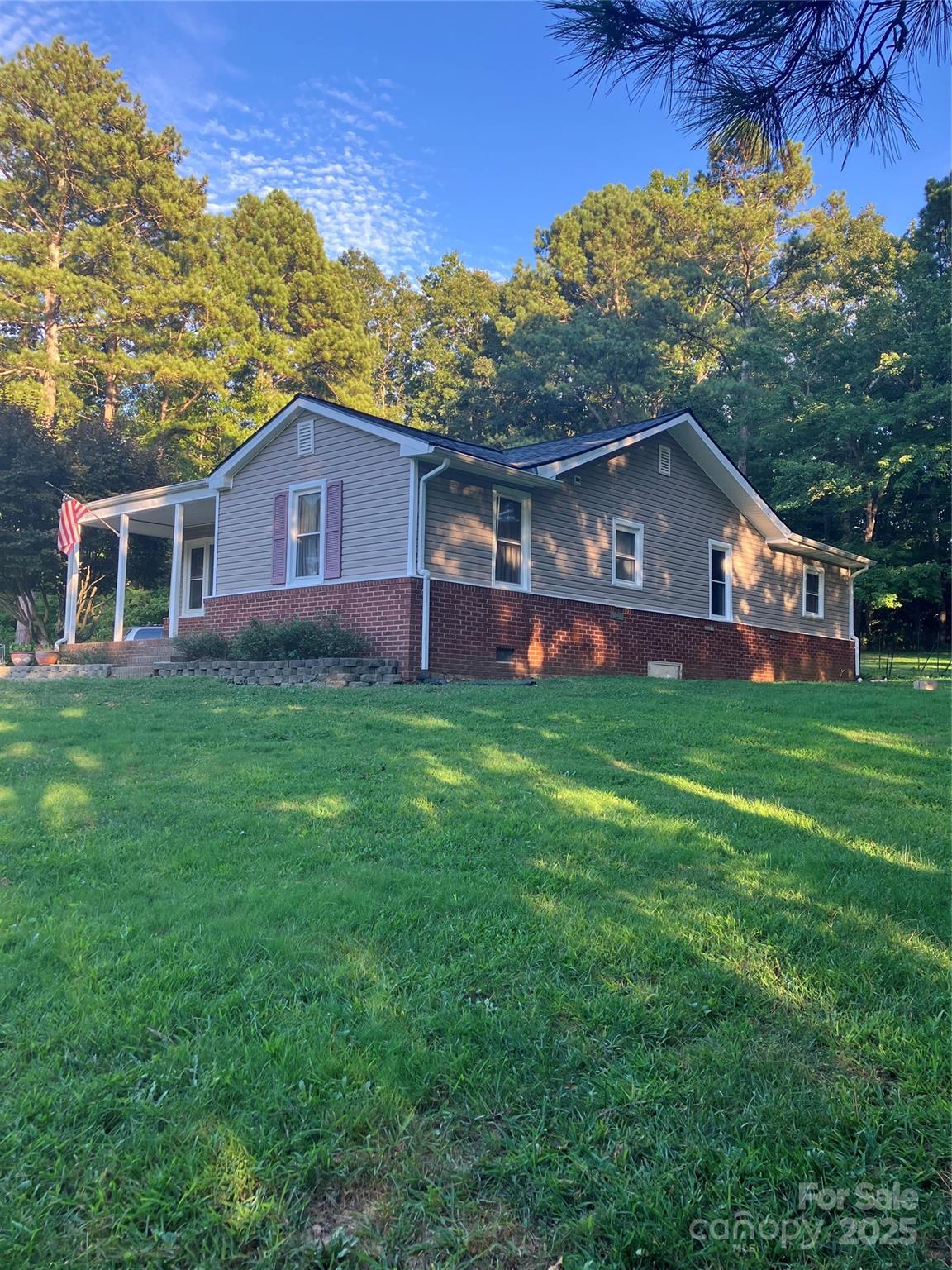36704 Mauldin Road Albemarle, NC 28001 - Photo 3 of 33 a view of a house with a yard