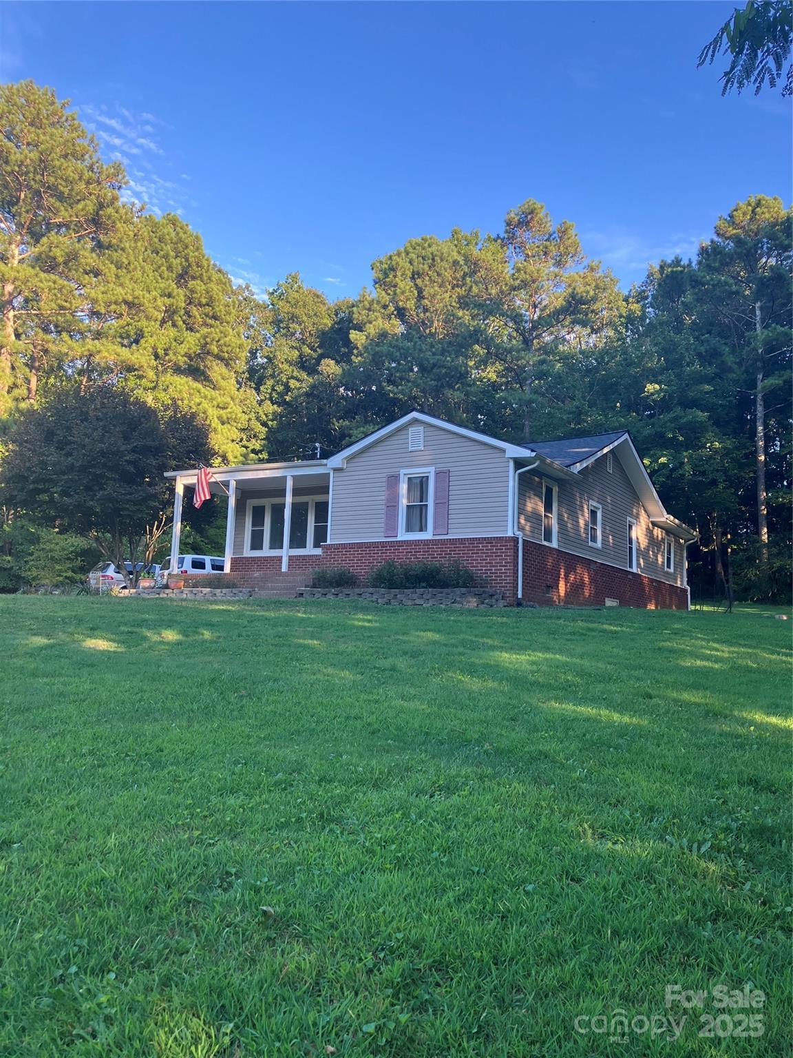 36704 Mauldin Road Albemarle, NC 28001 - Photo 5 of 33 a view of a house with a big yard