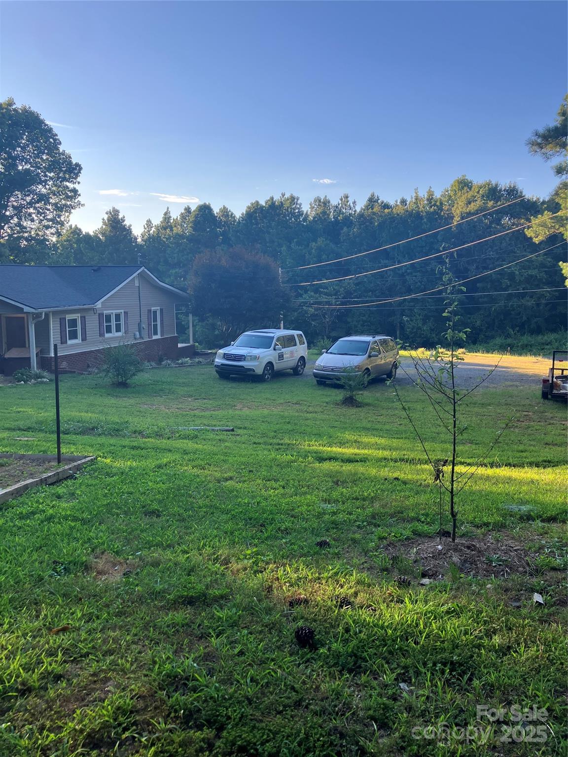 36704 Mauldin Road Albemarle, NC 28001 - Photo 8 of 33 a view of a house with a yard