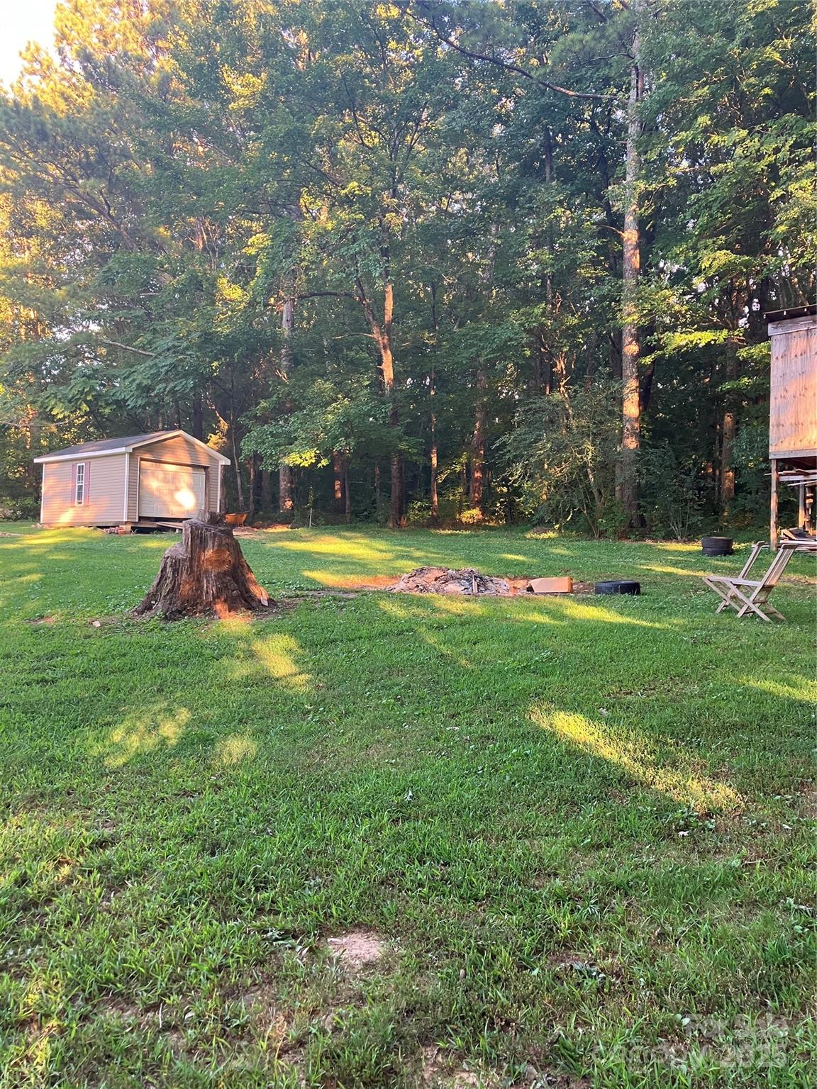 36704 Mauldin Road Albemarle, NC 28001 - Photo 9 of 33 a view of a park with swings and slides