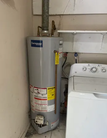 a utility room with washer and dryer