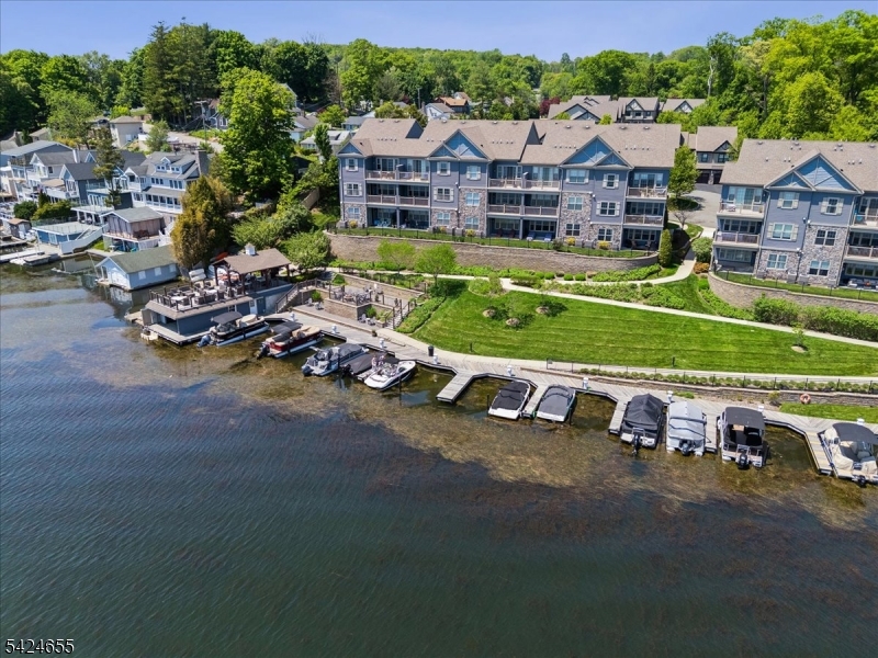 401 Mariners Pointe Hopatcong, NJ 07843 - Photo 38 of 42 an aerial view of a house with a garden and lake view