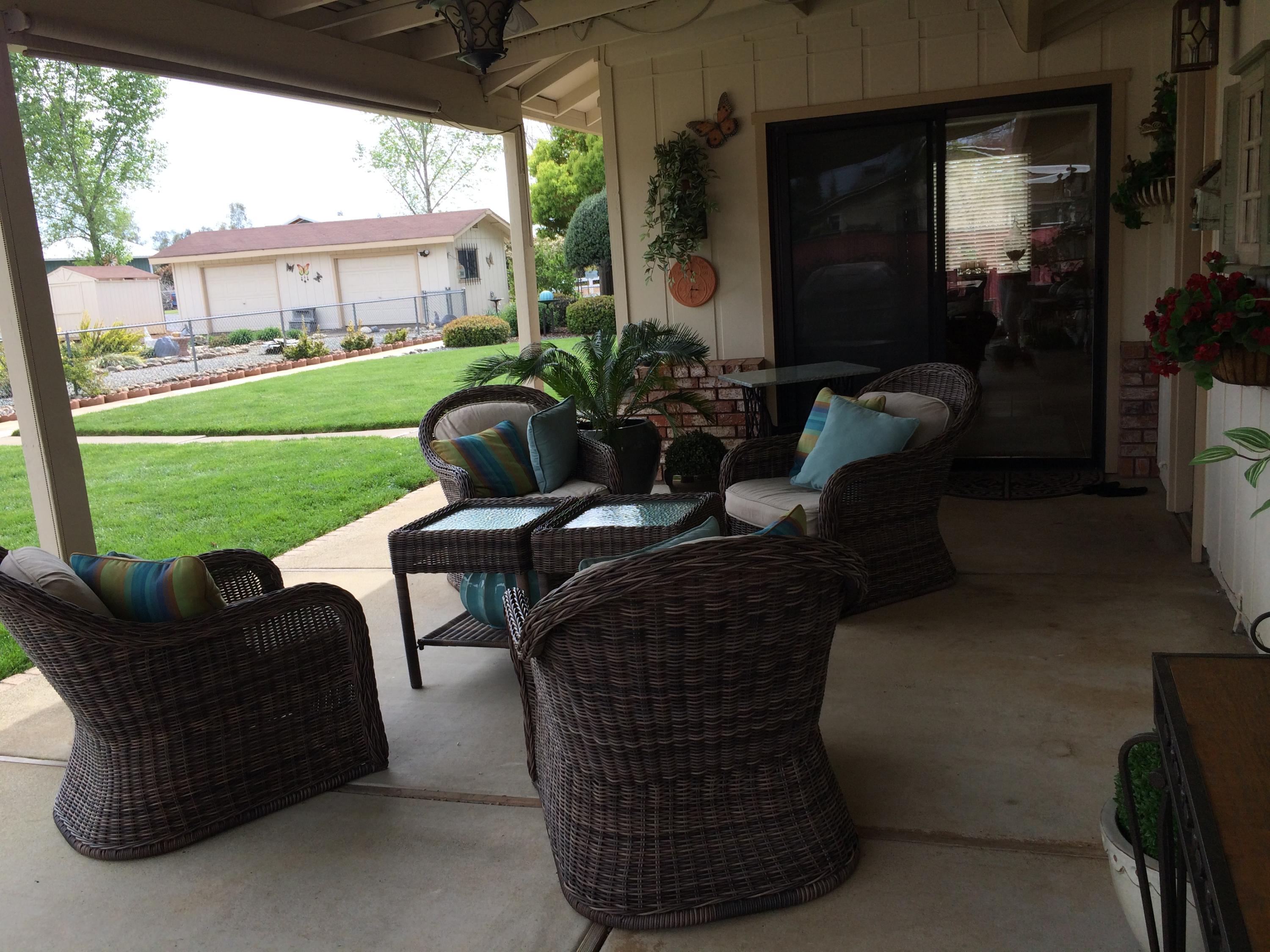 6577 Flicker Way Anderson, CA 96007 - Photo 24 of 41 a couple of chairs sitting in patio with a yard