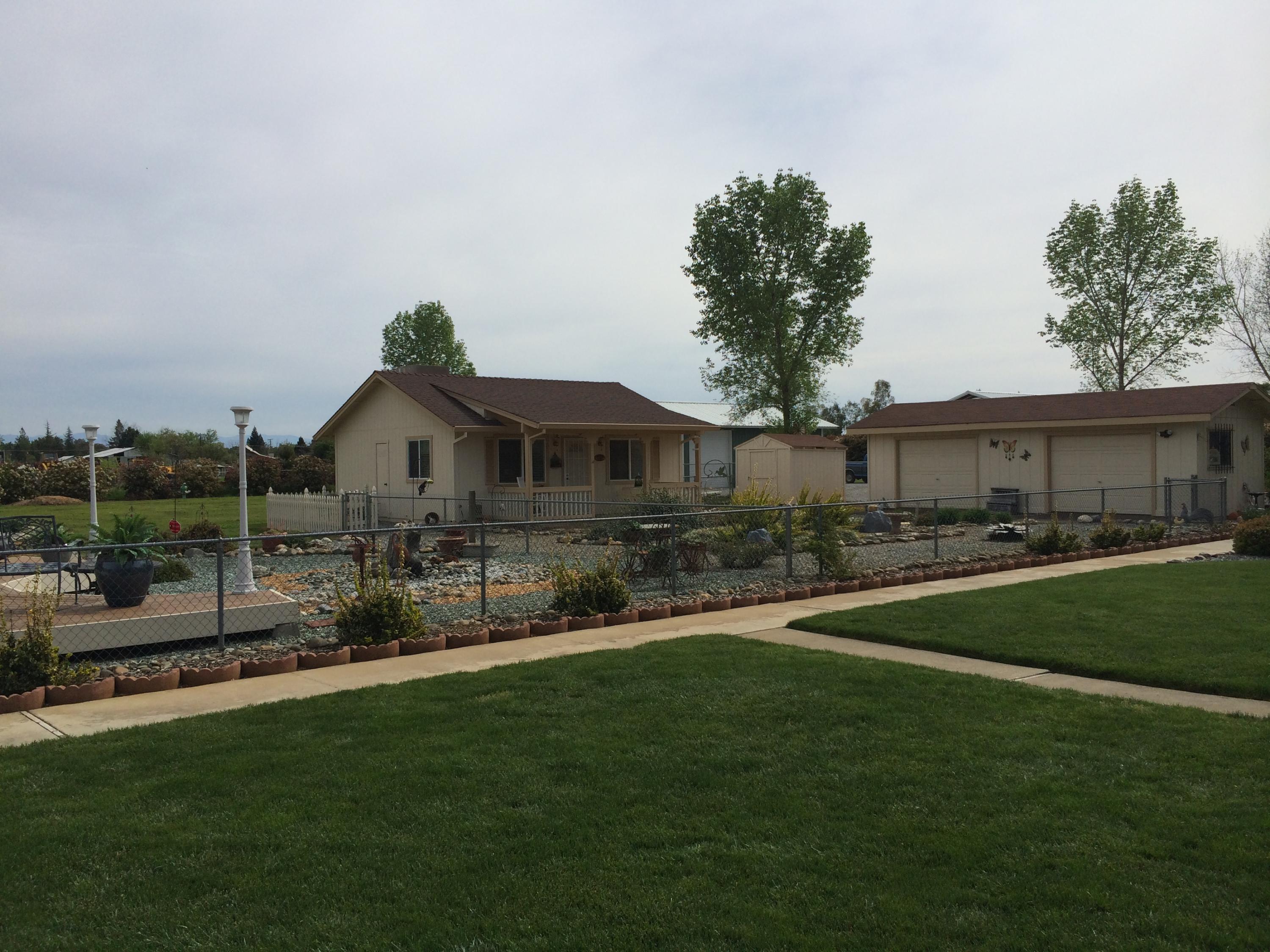 6577 Flicker Way Anderson, CA 96007 - Photo 25 of 41 a front view of house with yard and green space