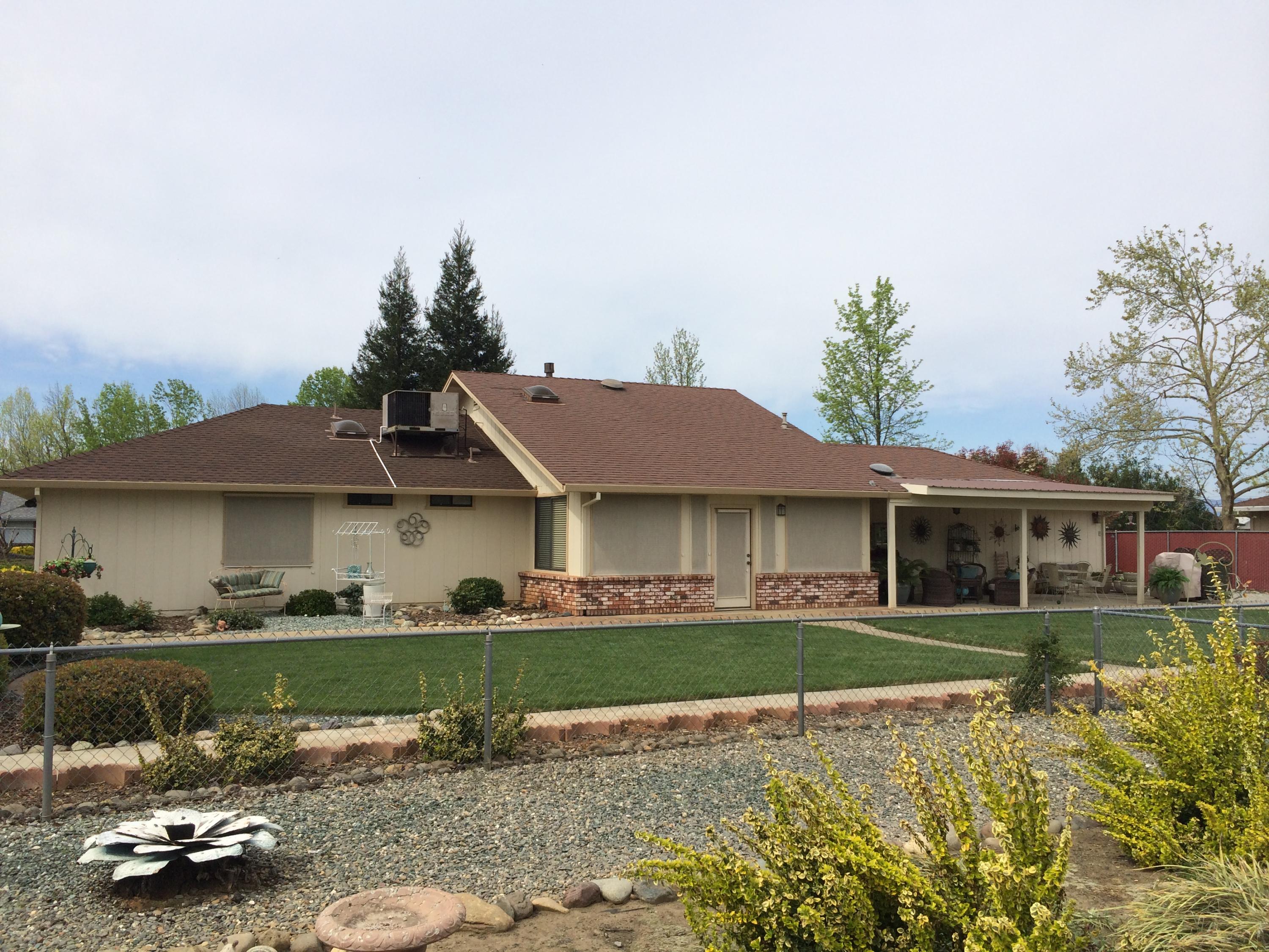 6577 Flicker Way Anderson, CA 96007 - Photo 3 of 41 front view of a house with a yard