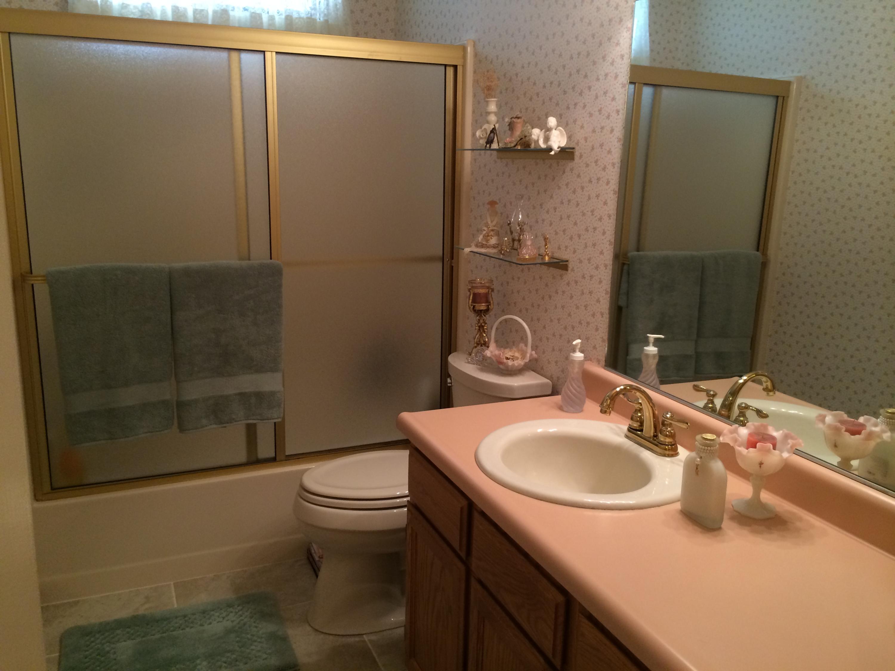 6577 Flicker Way Anderson, CA 96007 - Photo 34 of 41 a bathroom with a sink toilet and shower