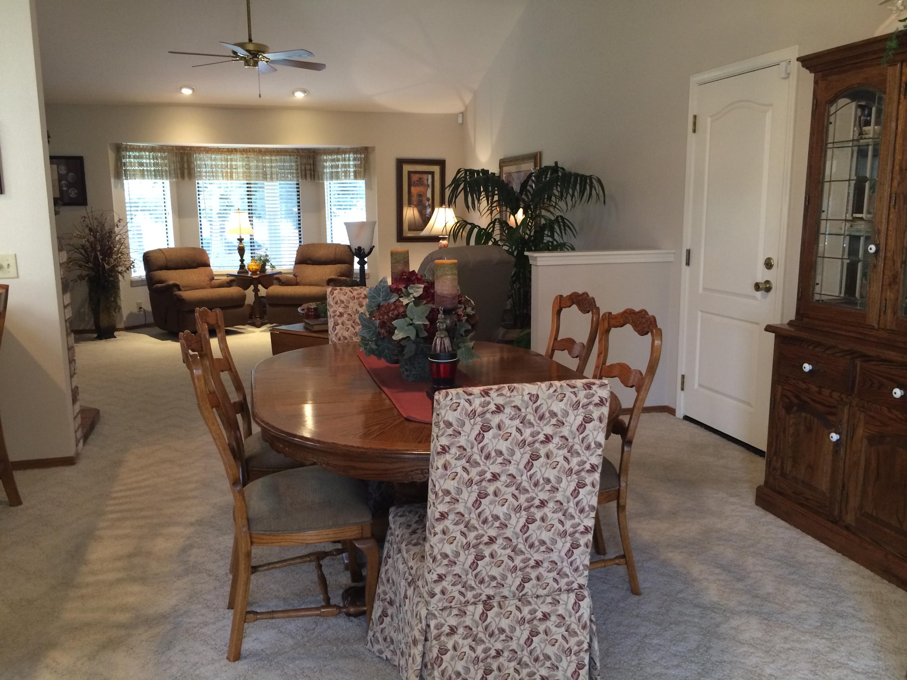 6577 Flicker Way Anderson, CA 96007 - Photo 4 of 41 a view of a dining room with furniture and chandelier