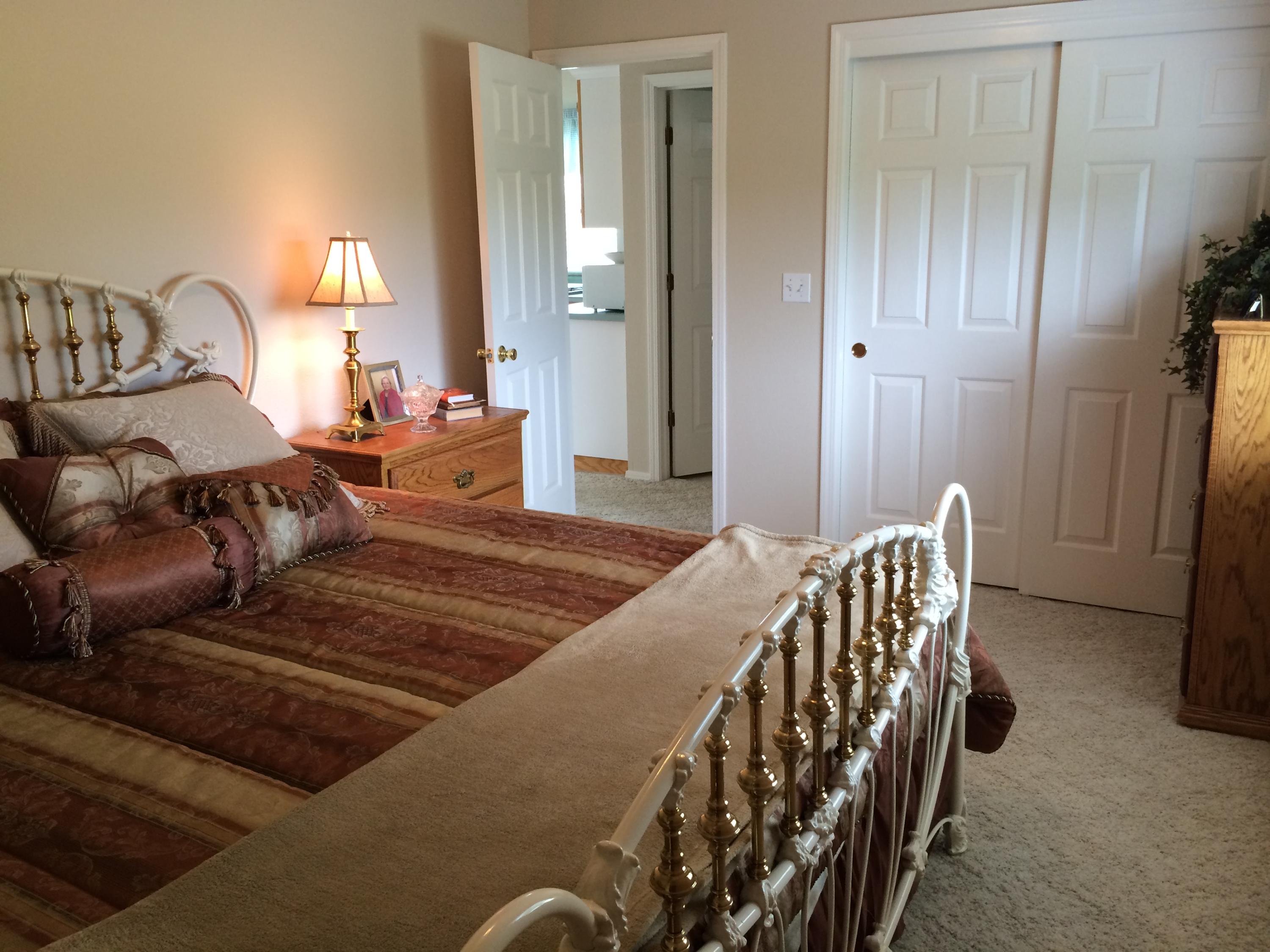 6577 Flicker Way Anderson, CA 96007 - Photo 7 of 41 a bedroom with a bed and a window