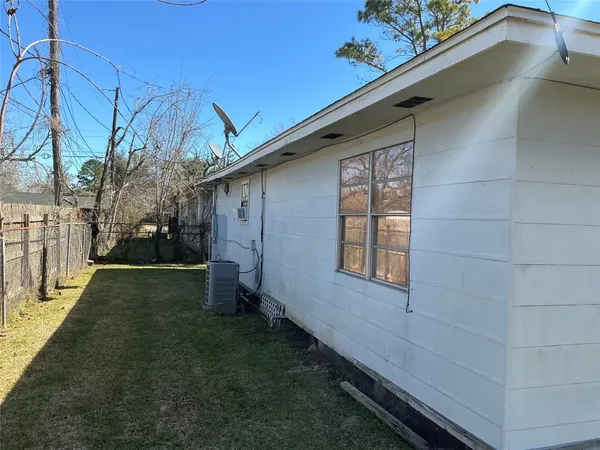 a house view with a backyard space