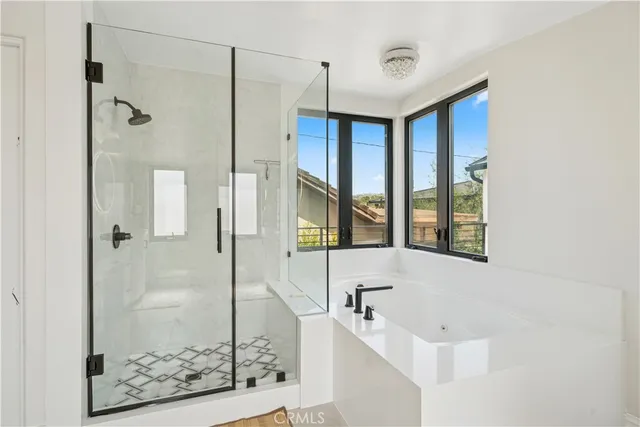 a bedroom with a bed and a cabinets