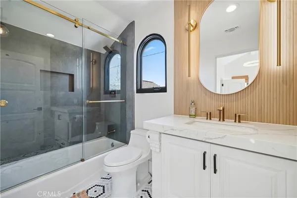 a view of a balcony with chairs