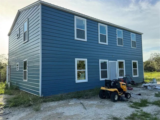 a front view of a house with patio