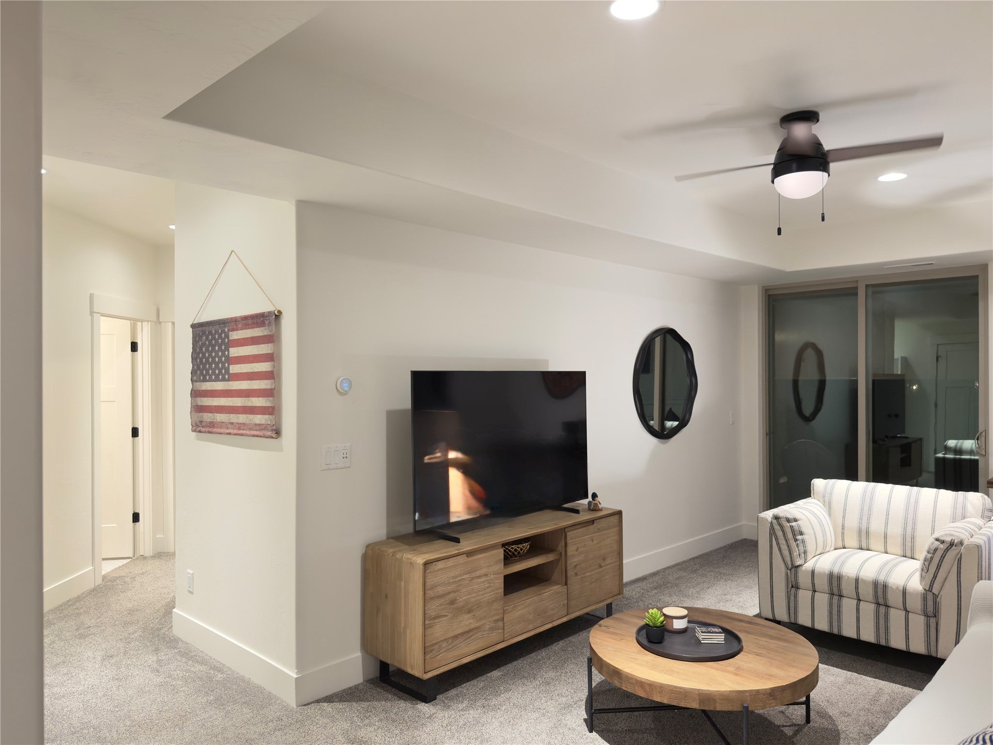 717 Icehouse Road Whitefish, MT 59937 - Photo 19 of 31 Living room lower level with recessed lighting, and ceiling fan