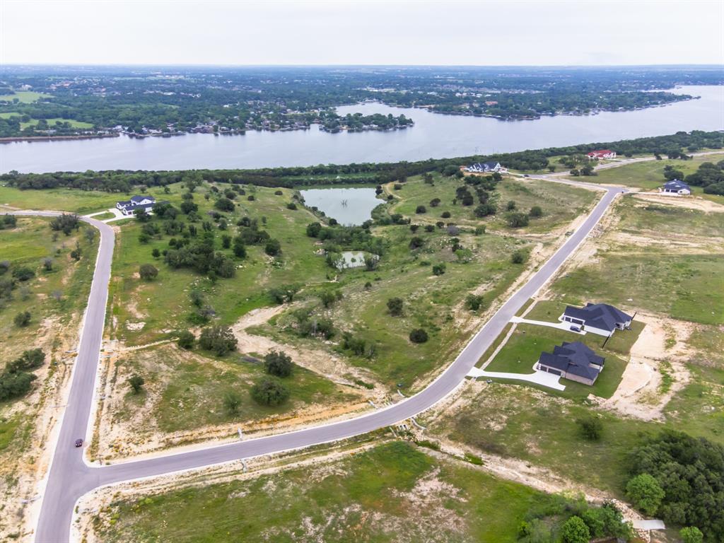 606 Rc Luker Court Granbury, TX 76048 - Photo 1 of 8 a view of a lake