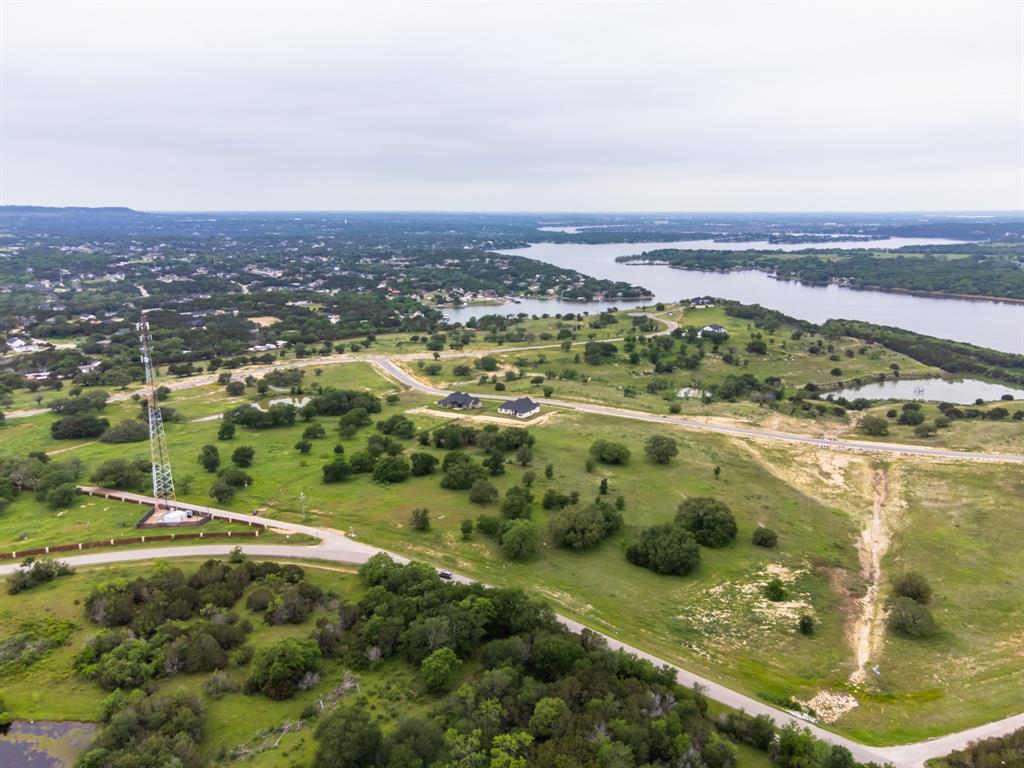 606 Rc Luker Court Granbury, TX 76048 - Photo 4 of 8 an aerial view of residential houses with outdoor space