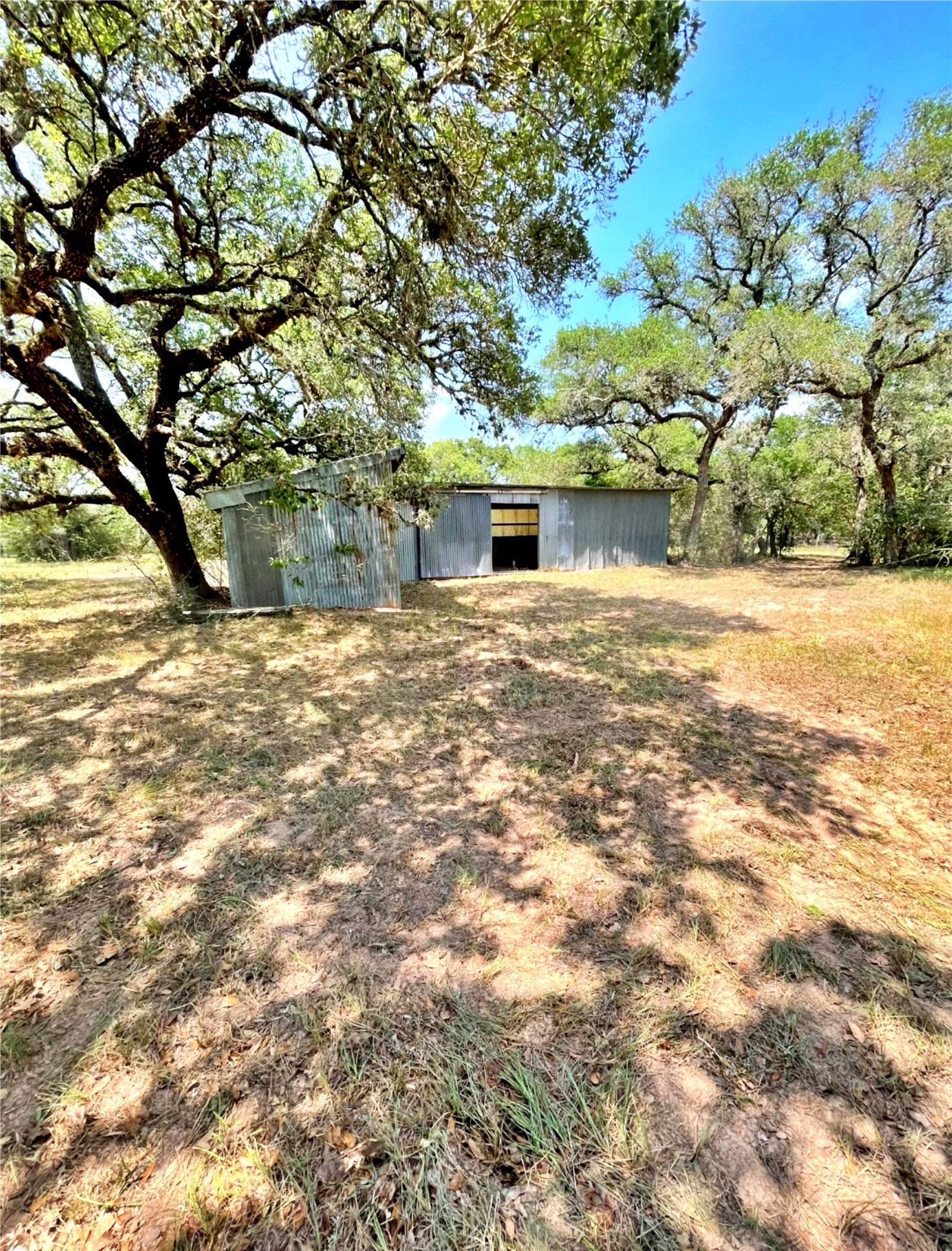 1085 Reeves Road Garwood, TX 77442 - Photo 18 of 28 a view of house with yard