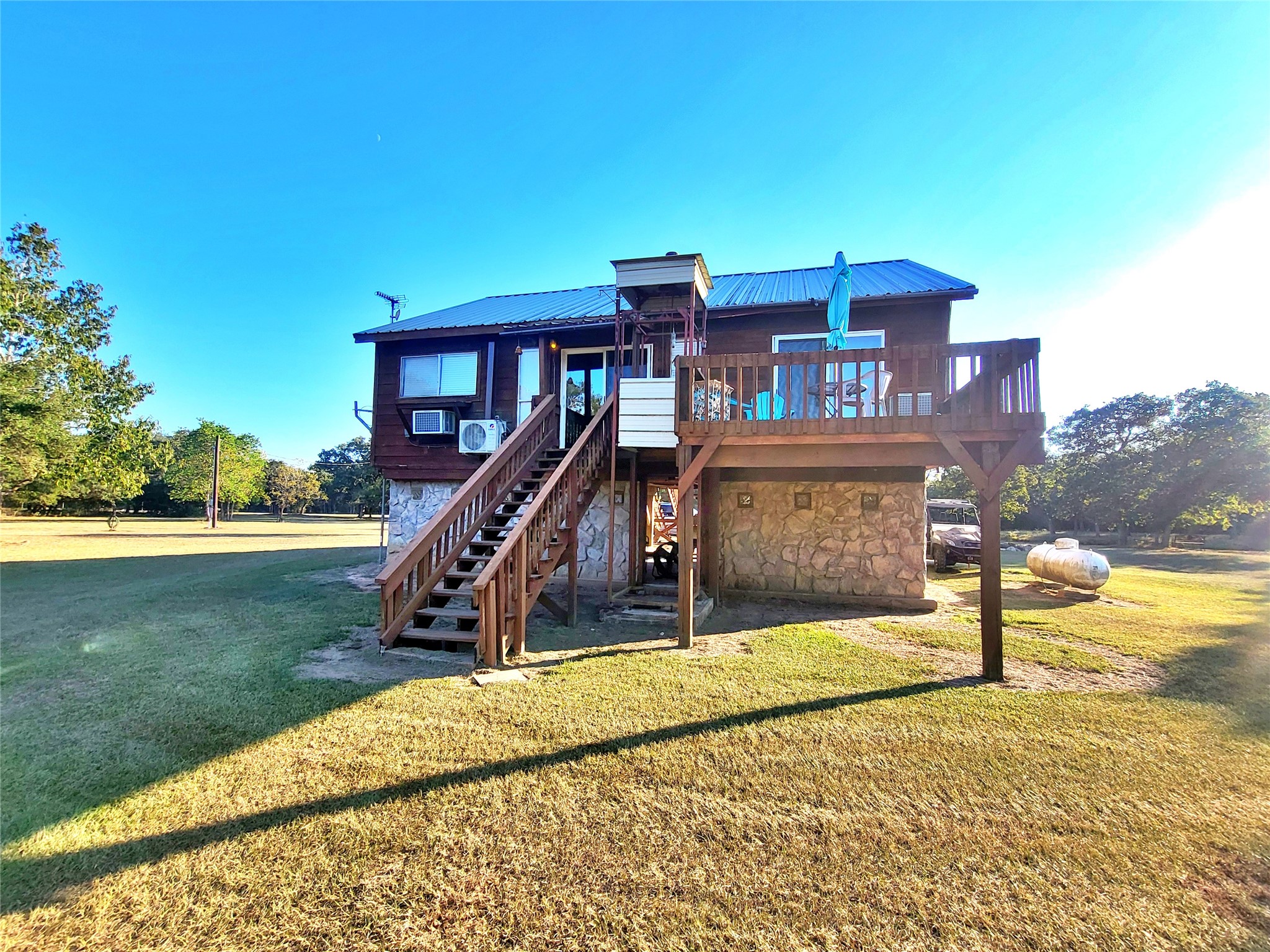 1085 Reeves Road Garwood, TX 77442 - Photo 20 of 28 a view of a house with a yard
