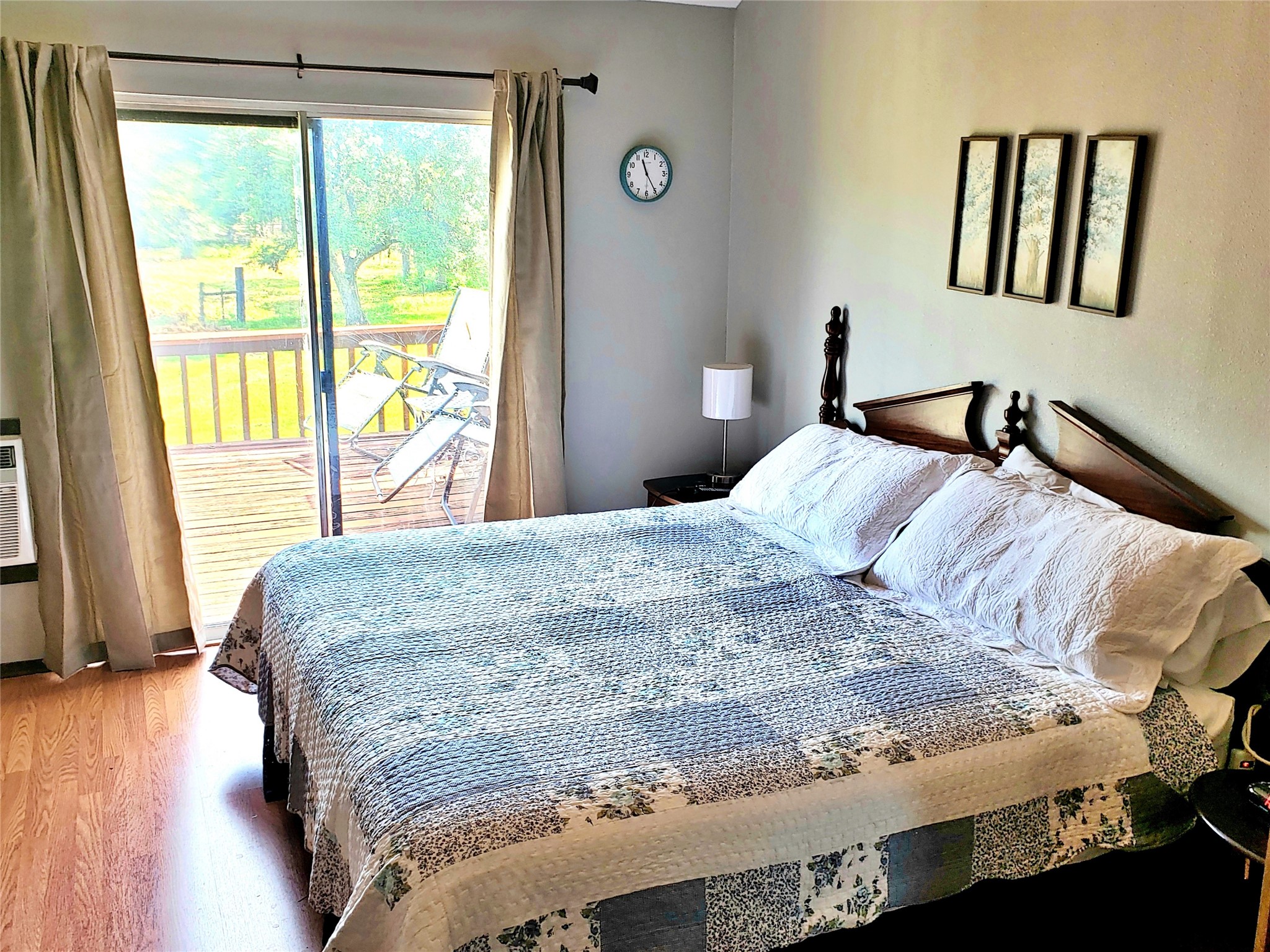 1085 Reeves Road Garwood, TX 77442 - Photo 7 of 28 a large bed sitting in a bedroom next to a window