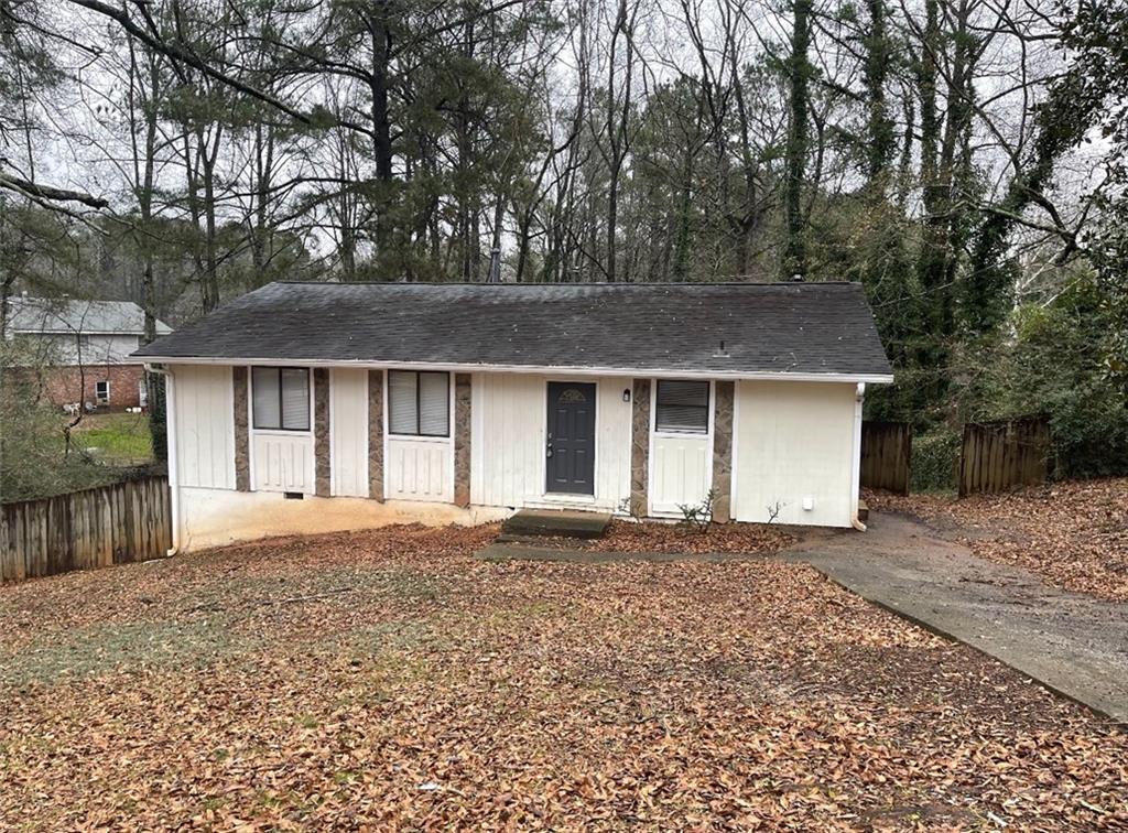 2310 Pebble Rock Way Decatur, GA 30035 - Photo 1 of 1 a house with trees in the background
