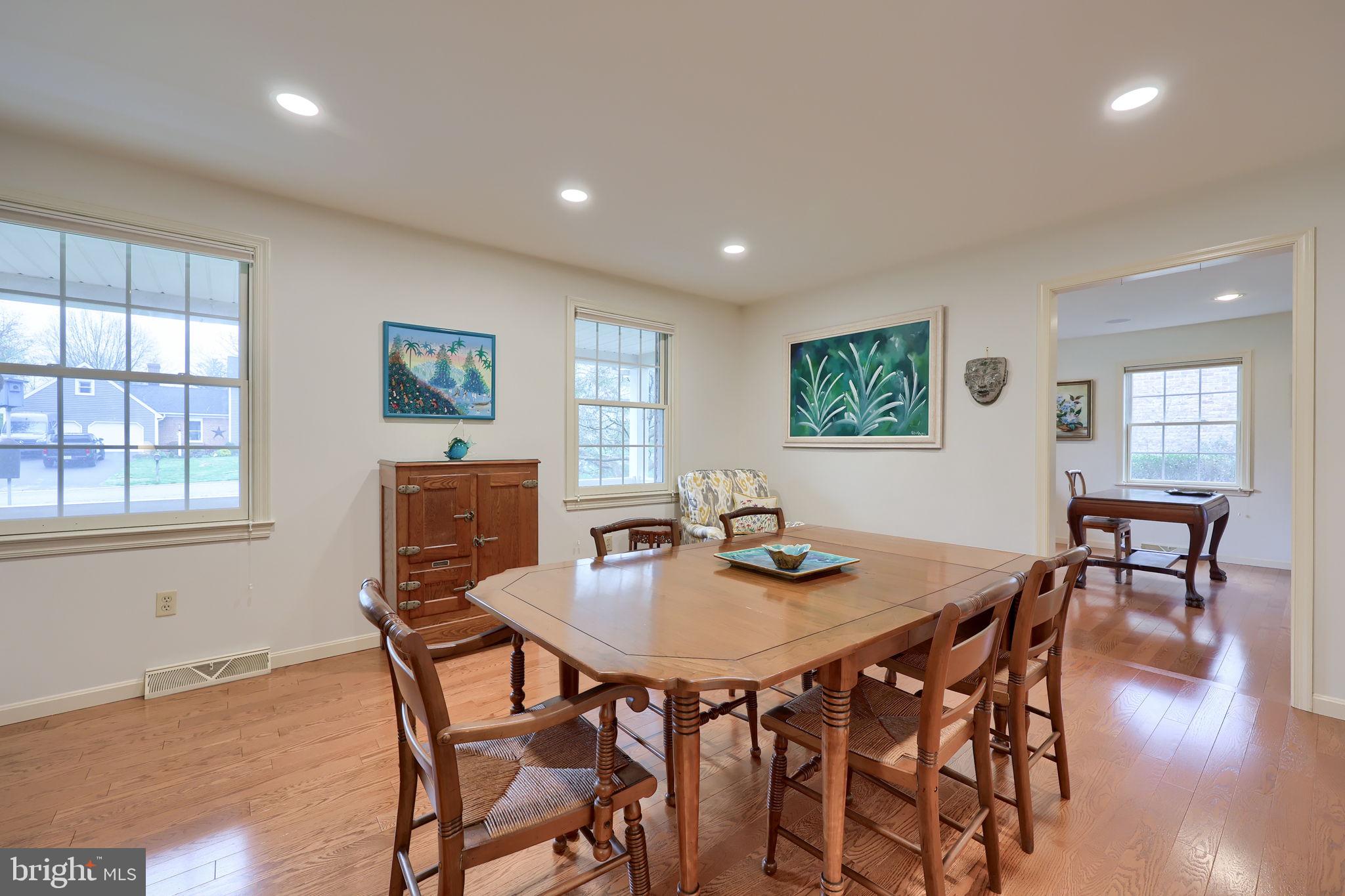 412 Wetherburn Drive Lancaster, PA 17601 - Photo 14 of 37 a view of a dining room with furniture and wooden floor