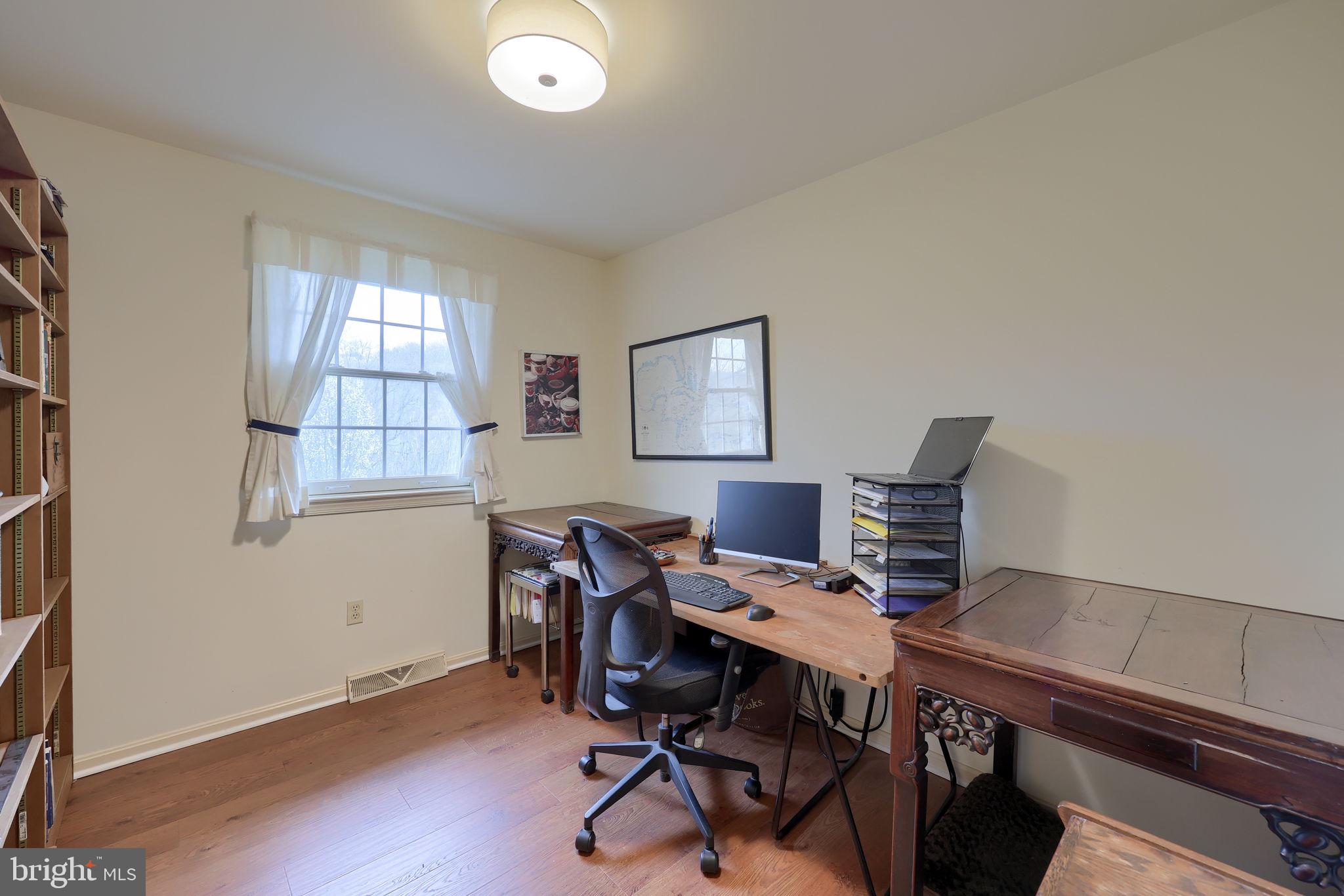 412 Wetherburn Drive Lancaster, PA 17601 - Photo 26 of 37 a view of a workspace with furniture and a window
