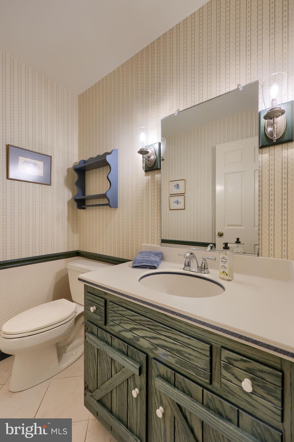 412 Wetherburn Drive Lancaster, PA 17601 - Photo 30 of 37 a bathroom with a sink a toilet and mirror